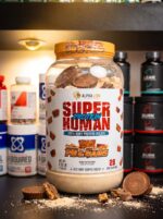 پروتئین وی ایزوله ۱۰۰٪ آلفا لاین مدل SuperHuman Protein طعم Peanut Butter Candy (عضله‌سازی خالص، زودجذب، بدون قند و چربی اضافه - ۱۰۵۴ گرم / ۲۸ سروینگ اصل آمریکا)