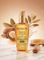 روغن مو کراتین و آرگان بیوکسین مدل Bioxcin Repairing Hair Oil