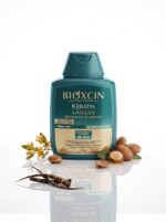 شامپو بیوکسین مدل Bioxcin Keratin & Argan حجم ۳۰۰ میلی‌لیتر ضد ریزش و ترمیم‌کننده (ترمیم تا ۹۴٪، ضد ریزش ناشی از شکستگی، نرم‌کننده، فاقد پارابن و مخصوص موهای آسیب‌دیده و کدر) - تصویر 2
